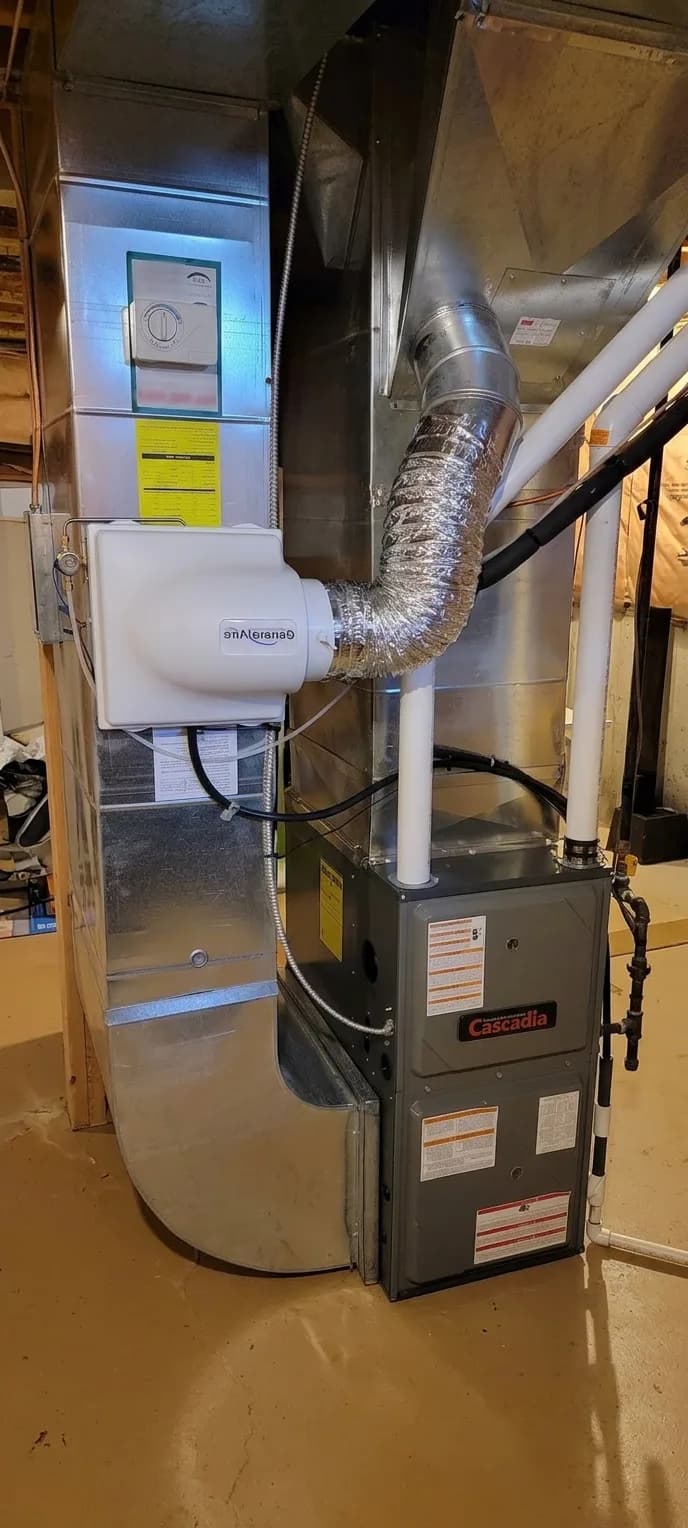 Furnace with steam humidifier and flex duct.